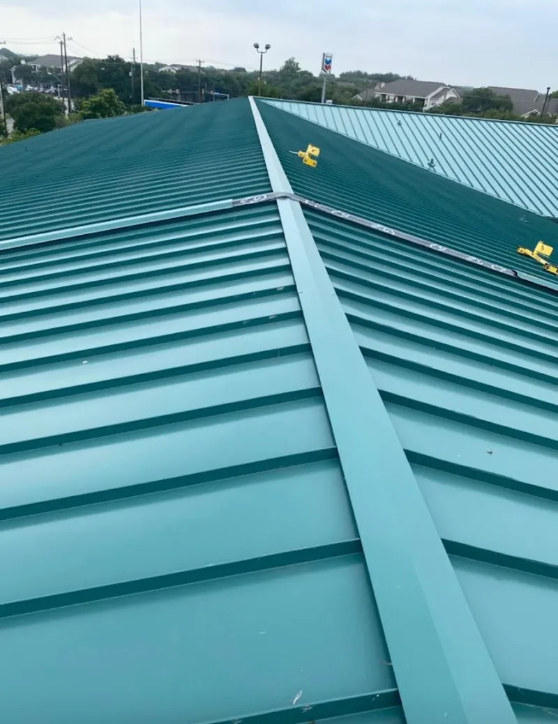 Green commercial metal roof ridge and valley for Metal Roof Repair in Saddle Brook
